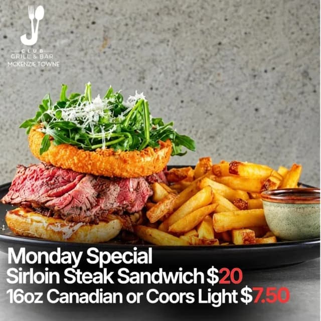 This is what cravings are made of. 🤤🔥 Tender, juicy steak piled high, crispy golden fries, and flavours worth coming back for. Come hungry. Leave happy. 🍟🥩 📍 J Club Grill & Bar | Calgary #mondayspecial❤️ #calgary #yycnow #yyc